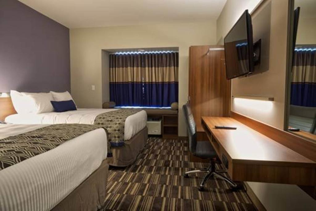 Microtel Inn & Suites Су-Сент-Мари Номер фото